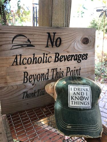 "I Drink and I Know Things" Distressed Trucker Cap