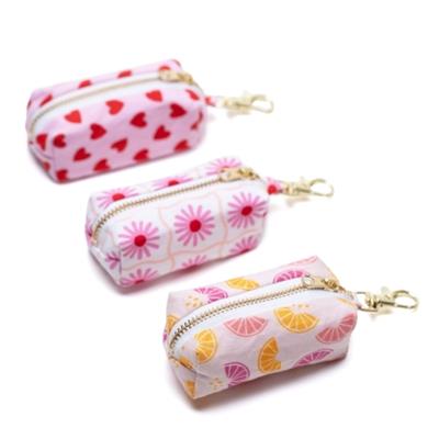 Dog Waste Bag Holders - Squeezed